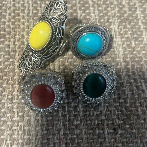 4 Rings… Costume Jewelry… stretchable bands